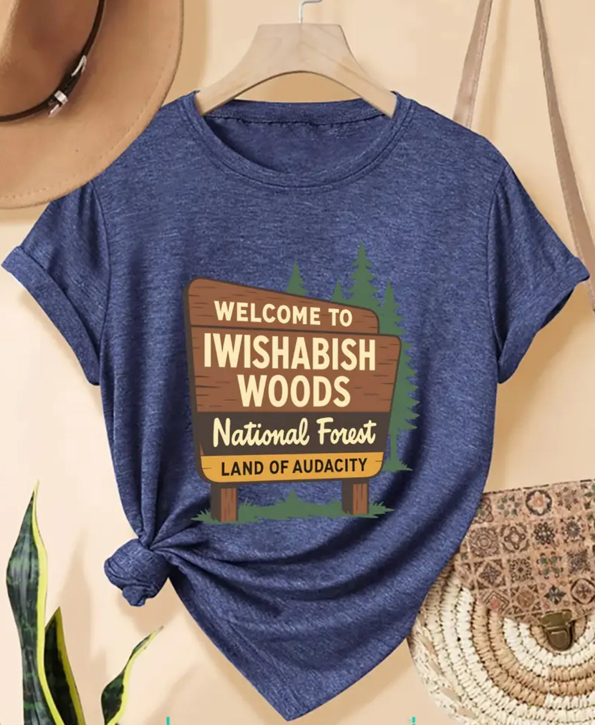 Plus Size Short Sleeve Graphic T-shirt “WELCOME TO IWISHABISH WOODS National Forest LAND OF AUDACITY”