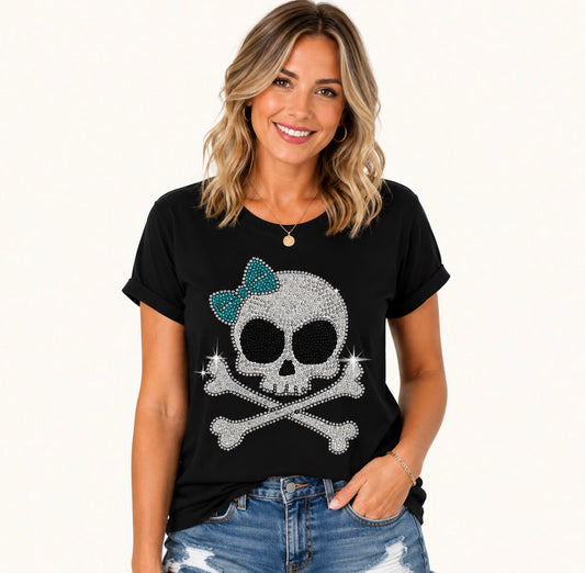 Graphic T-shirt “ RHINESTONE SKULL AND CROSSBONES WITH TEAL BOW”